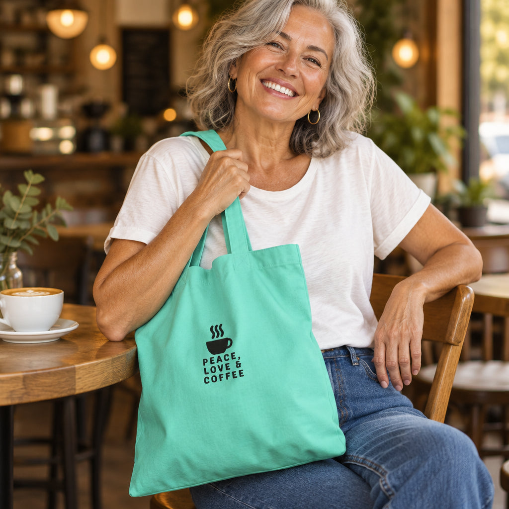 Bolsa de tela de algodón color verde menta con diseño frontal «Peace, Love & Coffee».