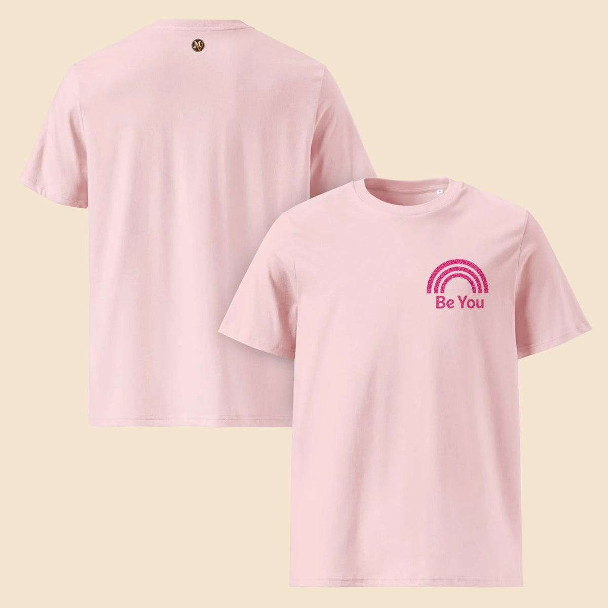 Camisetas rosa pastel con detalle de arcoíris rosa glitter en el pecho
